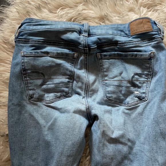 Distressed skinny jeans - Picture 4 of 4